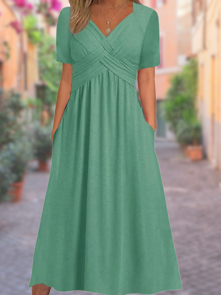 Comfortabele casual dames zomerjurk met V-hals, ideaal als strandjurk of voor warme dagen.