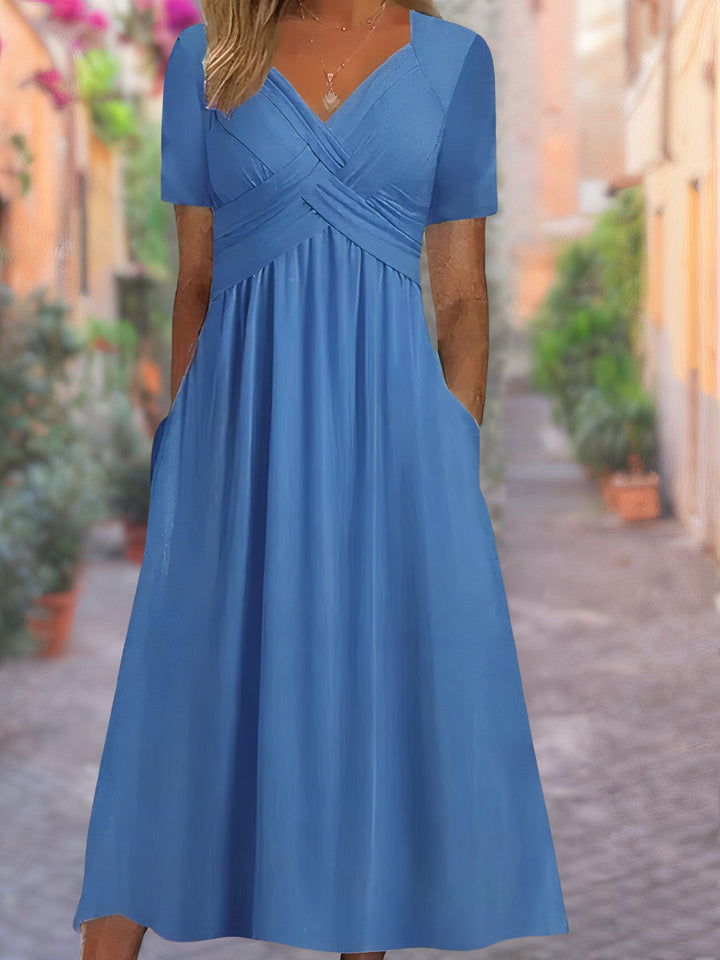 Lange losvallende dames zomerjurk met V-hals, comfortabele maxi-jurk voor zomerse dagen.