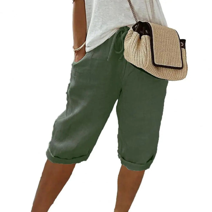 Lichtblauwe vintage dames kniebroek met elastische taille, zakken en comfortabele pasvorm, perfect voor zomer casual.