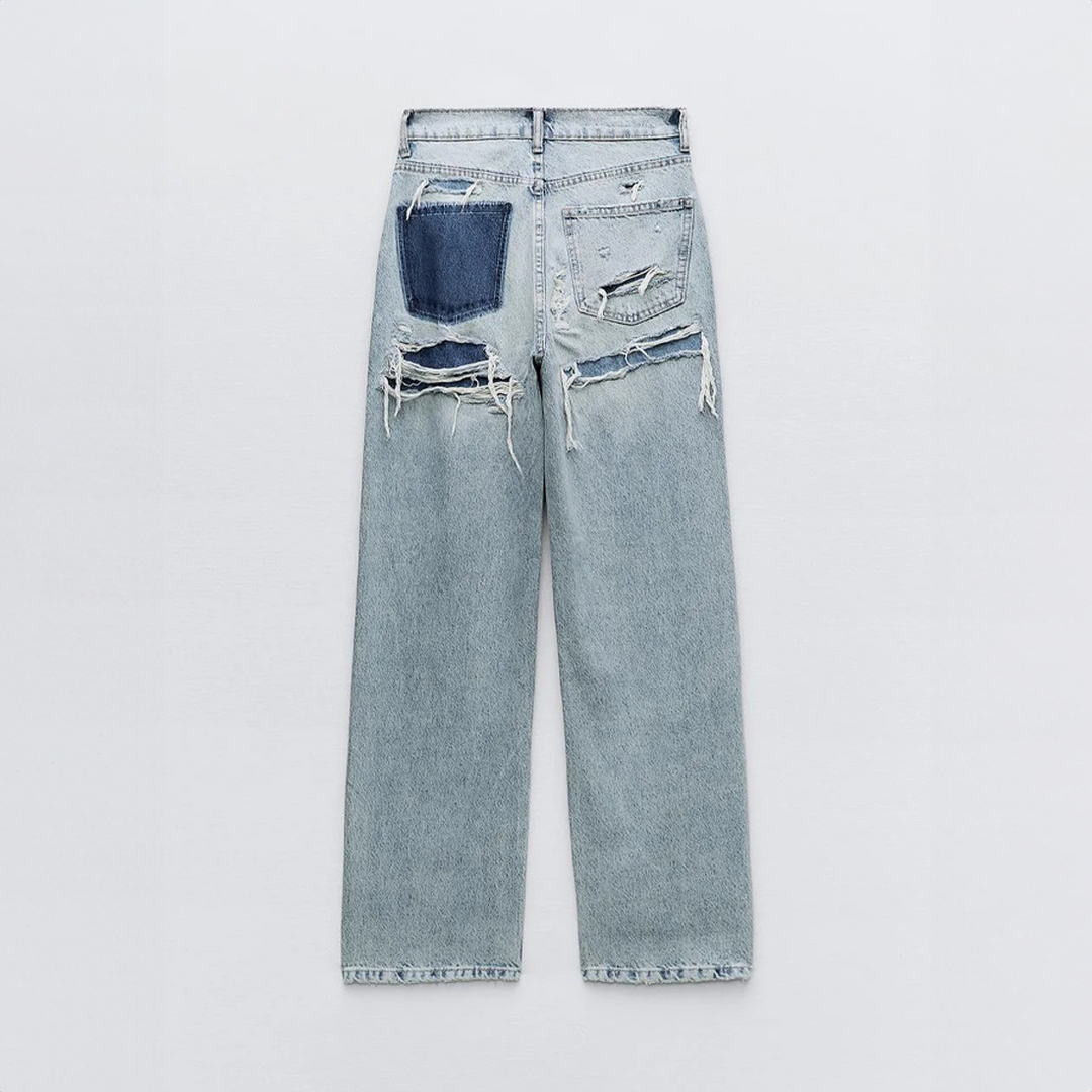 Vintage dames jeans met trendy ripped accenten; comfortabele en stijlvolle spijkerbroek.