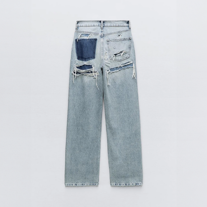 Vintage dames jeans met trendy ripped accenten; comfortabele en stijlvolle spijkerbroek.