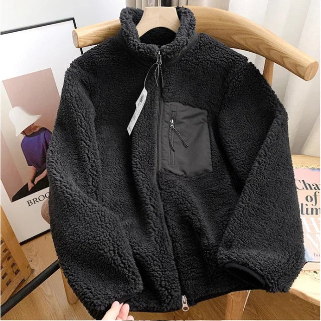 Dames sherpa jack met rits, warm en knus, ideaal voor koude dagen. Comfortabele winterjas.