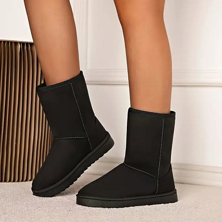 Dames warme slip-on winterlaarzen Aria met fleecevoering en antislipzool, perfect voor comfort en stijl in de winter.
