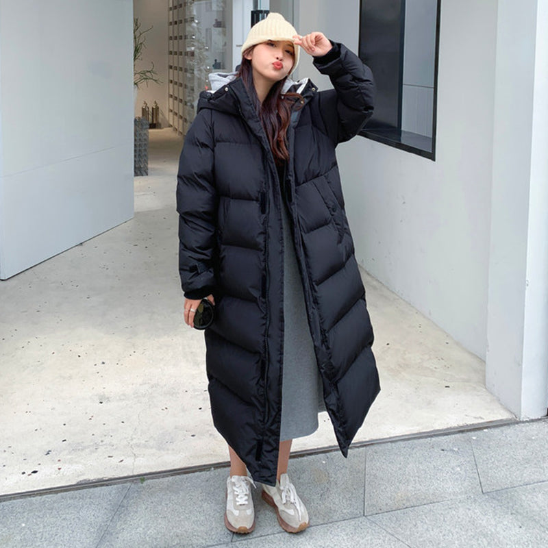 Dames warme Tommy Dons parka, stijlvol en klaar voor de winter.