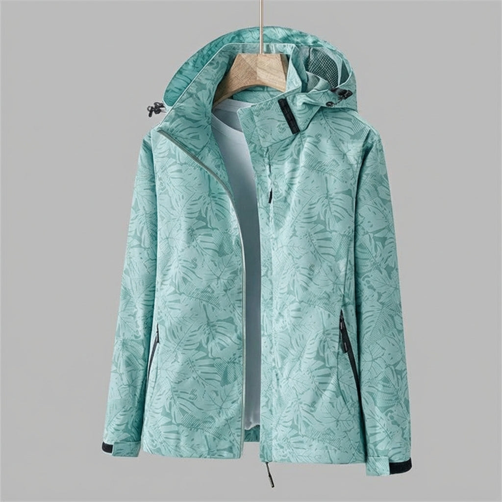 Dames jas met trendy bladpatroon, waterdicht en winddicht. De perfecte capuchon jas voor avonturiers.