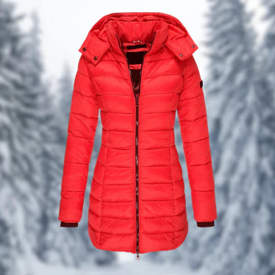 Dames regenjas, halflang en waterdicht, biedt warmte en stijl tijdens herfstige en winterse buien.