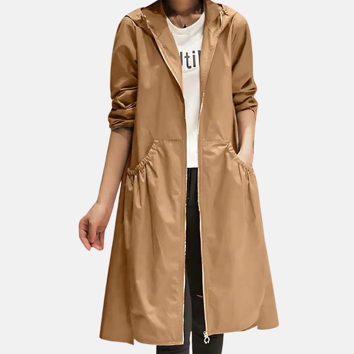 Casual dames herfstjas, knielang en waterdicht, perfect voor outdoor activiteiten. Stijlvol met capuchon.