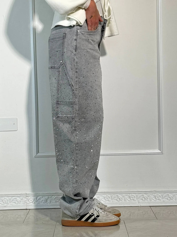 Comfortabele dames wide leg jeans, versierd met glimmende rhinestones. Casual fashion item.