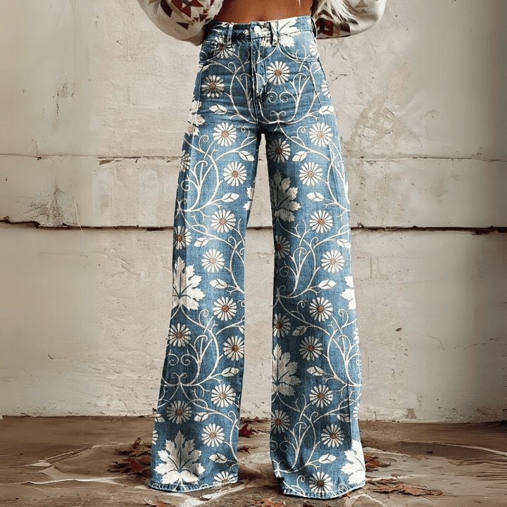 Moderne dames spijkerbroek met wijde pijpen en hoge taille, voorzien van een unieke trendy print.
