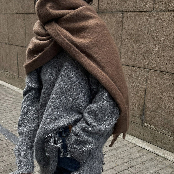 Modieuze winter sjaal voor dames, gemaakt van premium wol. Voor een warme en trendy look.