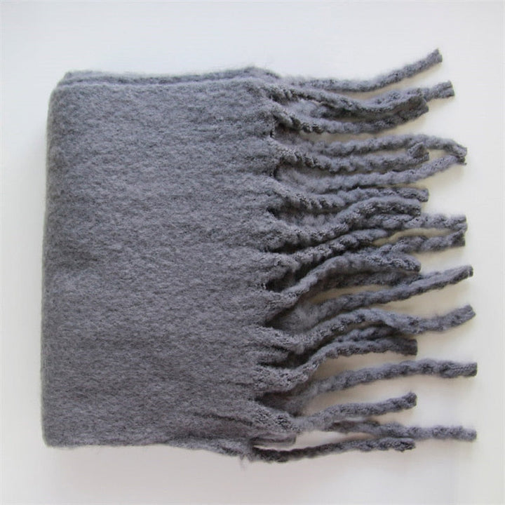 Comfortabele dames sjaal van wol; essentieel voor koude dagen. Ultieme warmte en zachtheid.