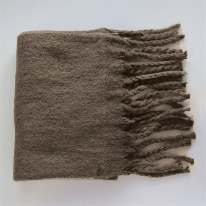 Zachte wollen dames sjaal; een tijdloos accessoire voor elke outfit. Comfortabel en chic.