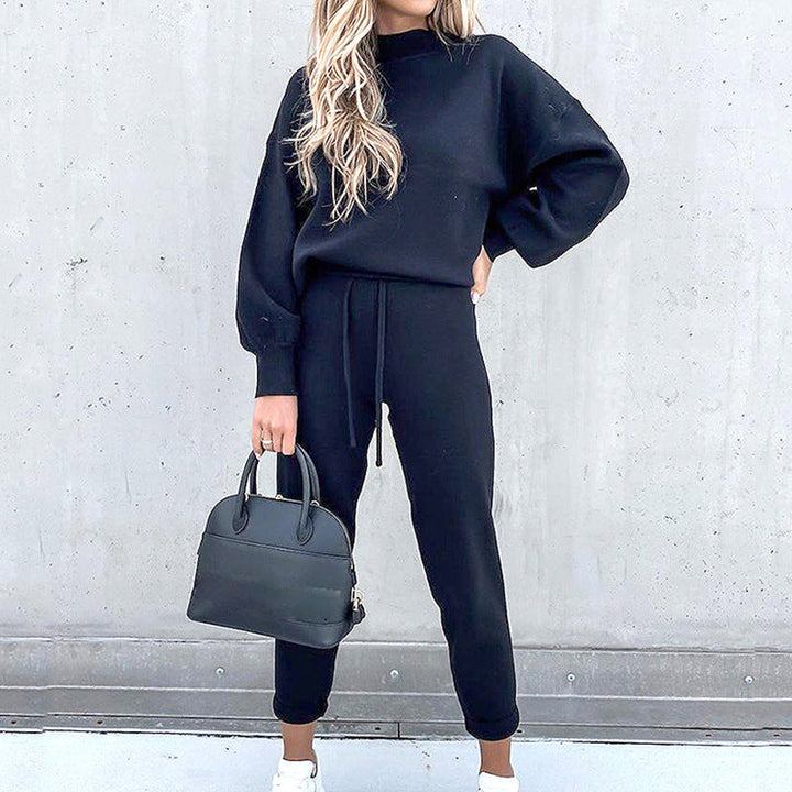 Stijlvol dames huispak: high waist broek en zachte stof. Tweedelige set comfortkleding voor thuis en ontspanning.