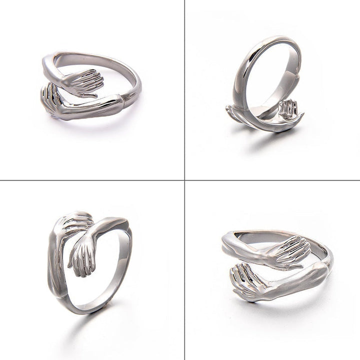 Romantische zilveren knuffelring voor dames. Perfect geschenk van liefde, verstelbaar en hypoallergeen sieraad.