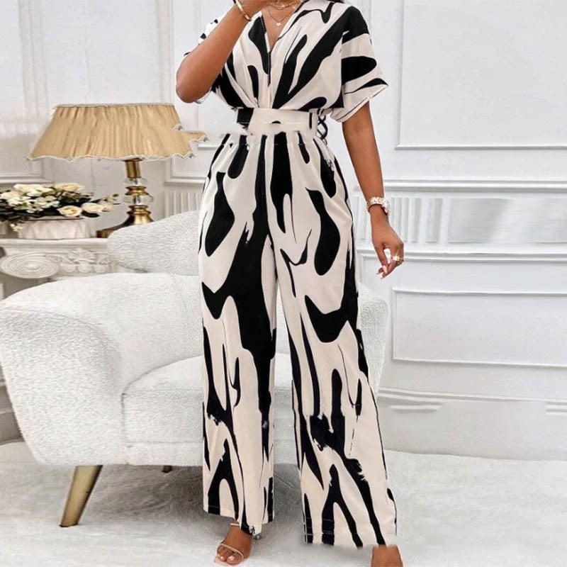 Comfortabele dames jumpsuit met modieuze print en flatterende V-hals, ideaal als stijlvolle zomeroutfit.