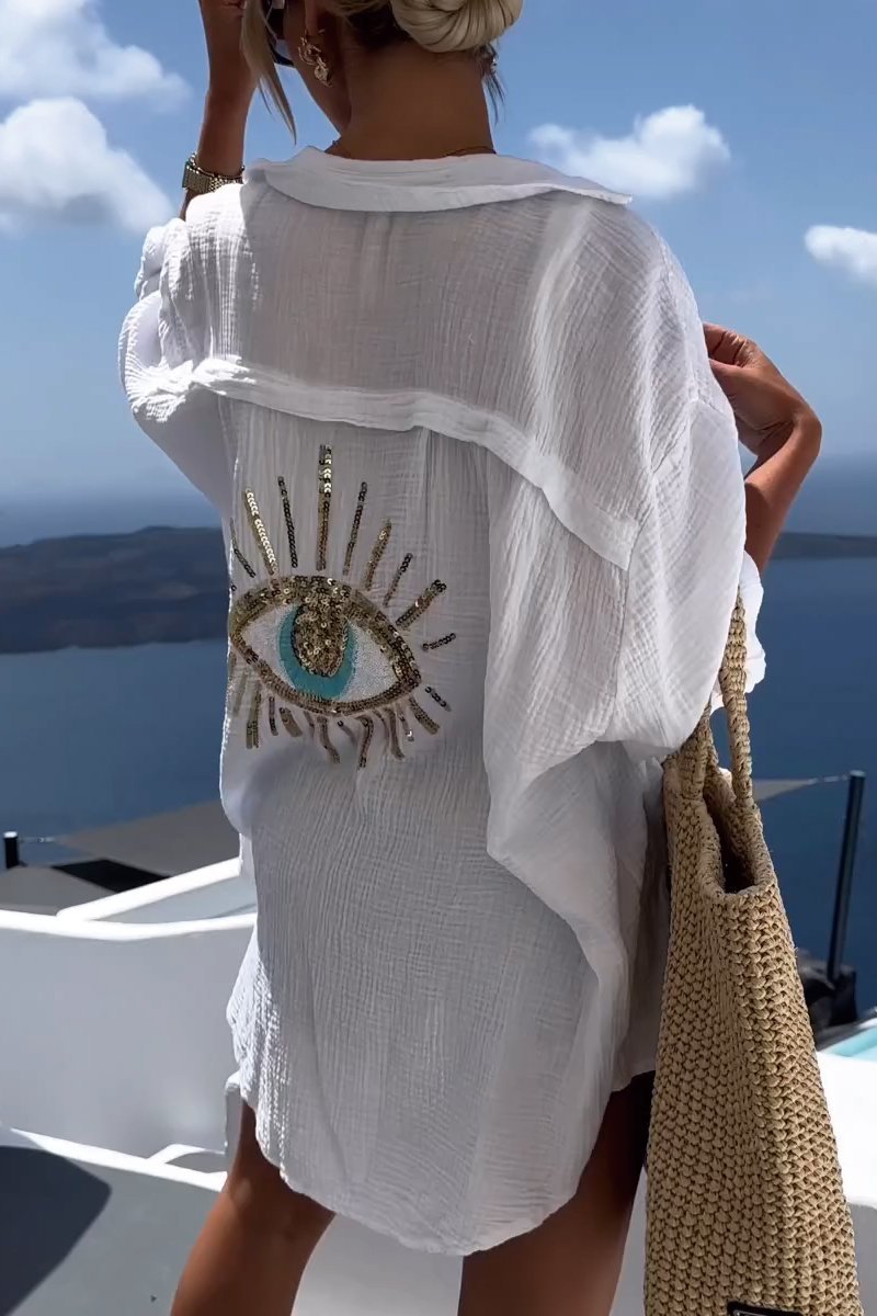 Dames zomer tuniek Serena met elegante versierde achterkant, V-hals en lange mouwen.