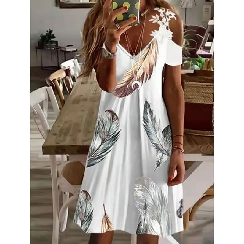 Casual FlowerDress™ dames zomerjurk met kleurrijk bloemenpatroon, korte mouwen, perfecte pasvorm.