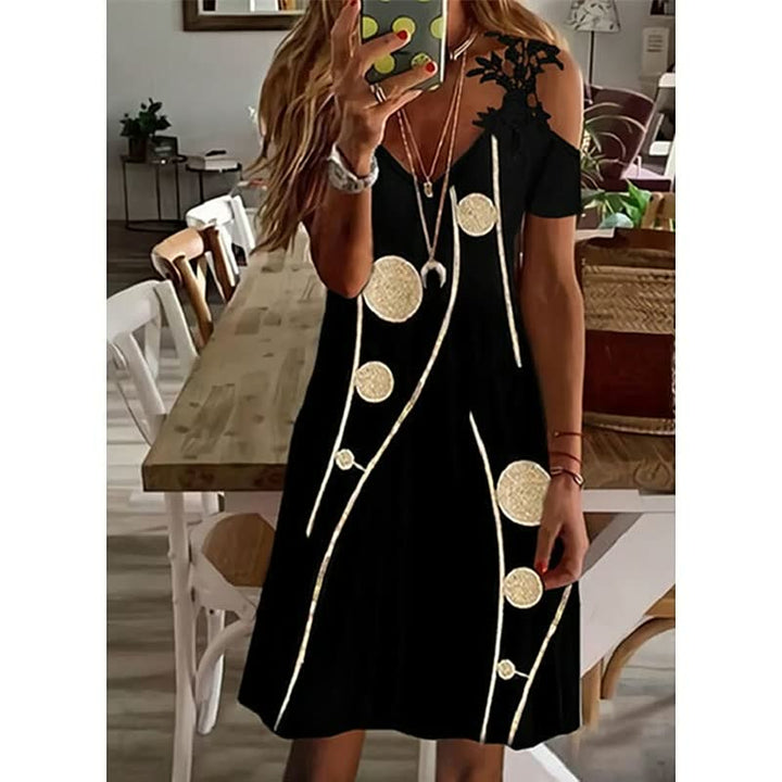 Dames zomerjurk FlowerDress™ met elegant bloemendesign, korte mouwen en comfortabele pasvorm.