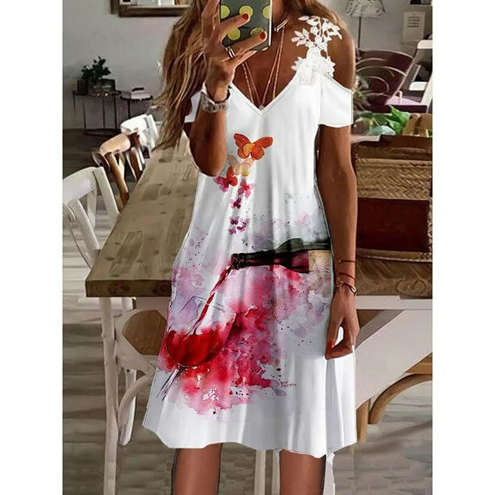 FlowerDress™ midi jurk met levendig bloemendessin, korte mouwen en een stijlvolle uitstraling.