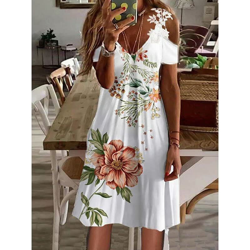 Perfecte FlowerDress™ zomerjurk voor dames, ideaal voor strand, terras of casual uitjes.