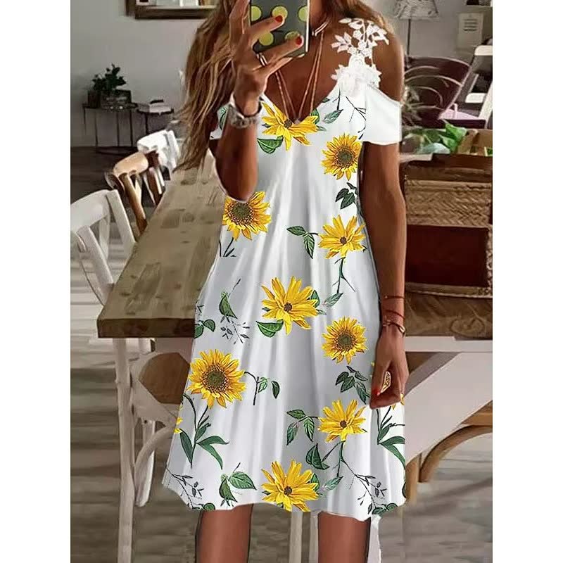 FlowerDress™ damesjurk met korte mouwen en kleurrijk bloemendesign, een comfortabele zomerkeuze.