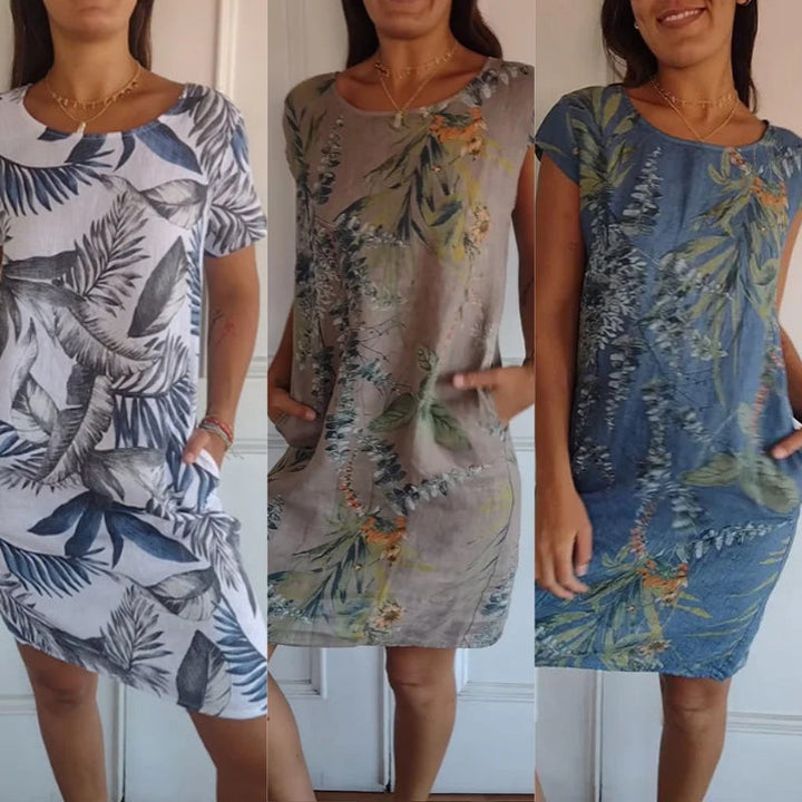 Dames zomerjurk met bloemenprint, ronde hals en A-lijn. Comfortabel en elegant voor de zomer.
