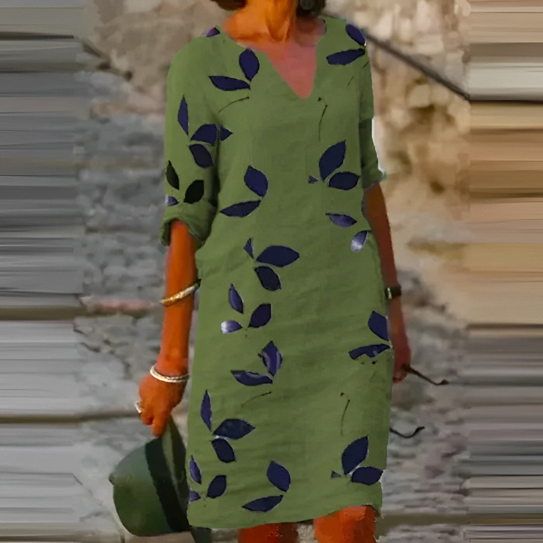 Luchtige dames zomerjurk met tropische bladerenprint, perfect voor een comfortabele en stijlvolle zomerdag.