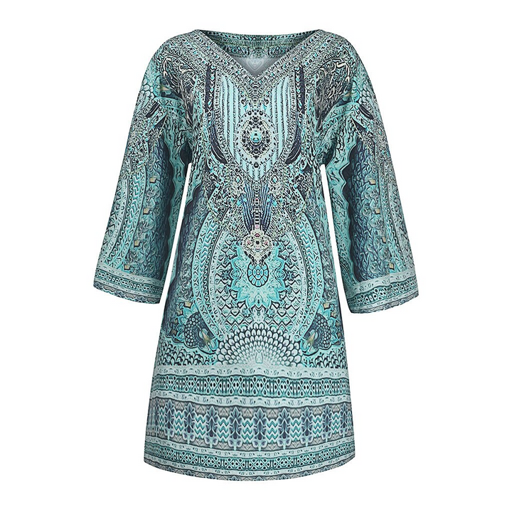 Modieuze dames zomerjurk met levendige vrolijke print, comfortabele pasvorm en korte mouwen.