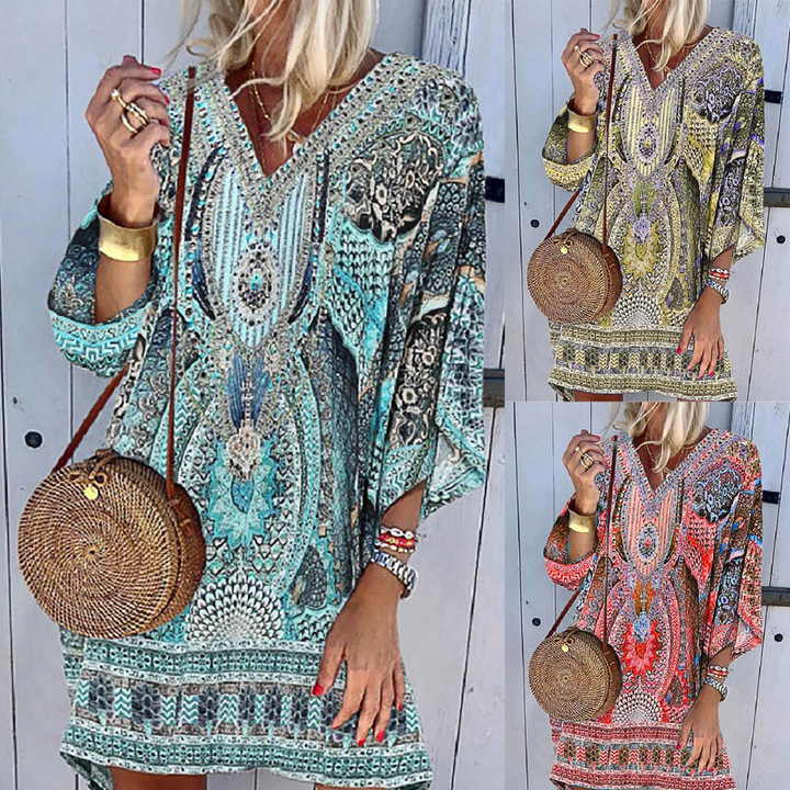 Heerlijk comfortabele dames zomerjurk met vrolijke print. Modieuze Eva™ jurk voor casual en stranddagen.
