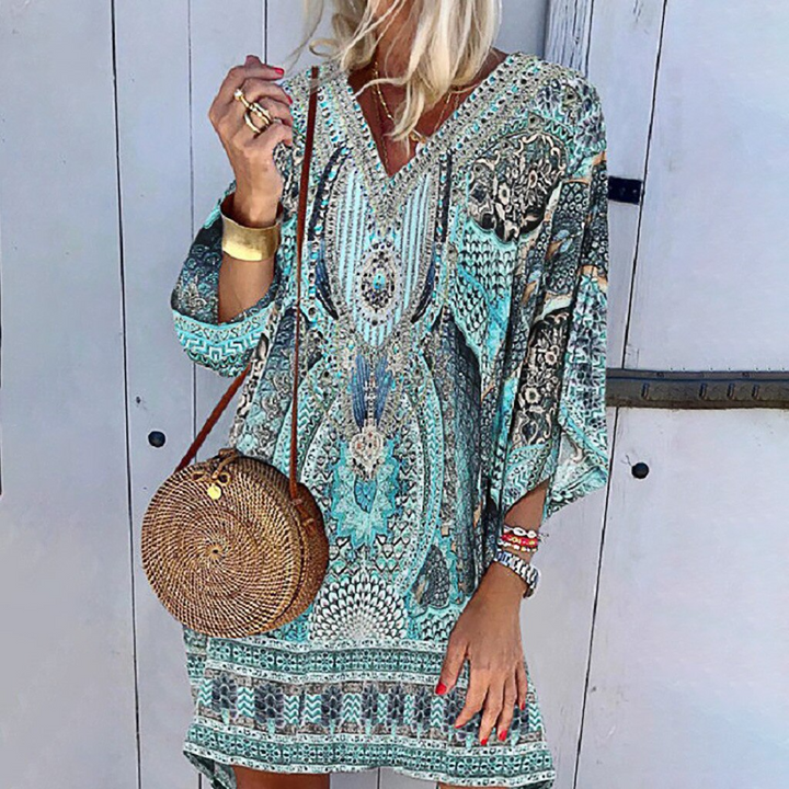Stijlvolle dames zomerjurk (Eva™) met vrolijke print, korte mouwen en ronde hals. Perfect voor de zomer.