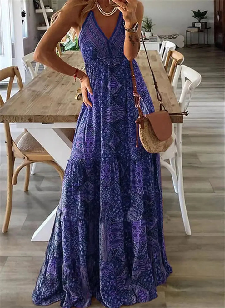 Dames zomerse boho maxi jurk met levendige bloemenprint, elegante V-hals en luchtig design. Perfect voor strand of feest.