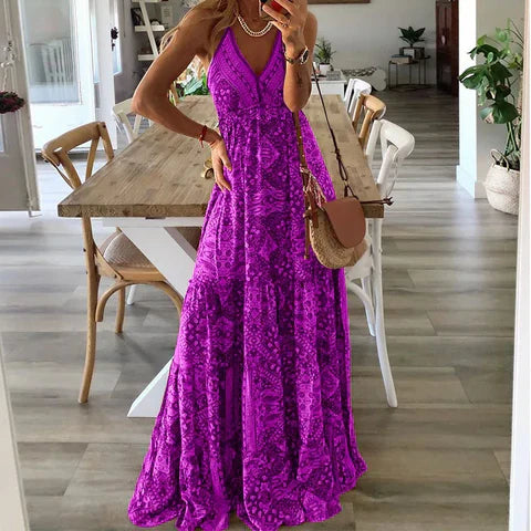 Elegante dames maxi jurk met opvallende bloemenprint, V-hals en mouwloos ontwerp. Trendy vrouwenmode voor de zomer.
