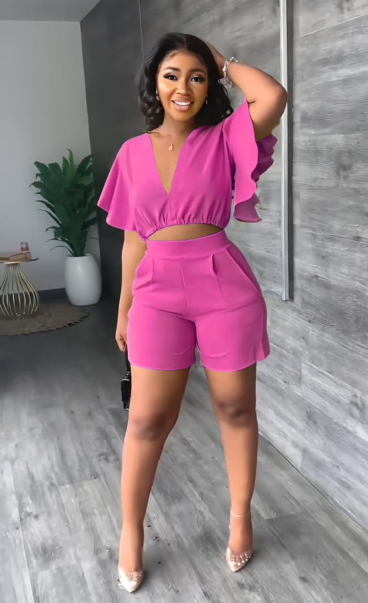 Comfortabele en trendy Marlene zomerset, tweedelig geplooid met crop-top en hoge taille shorts.