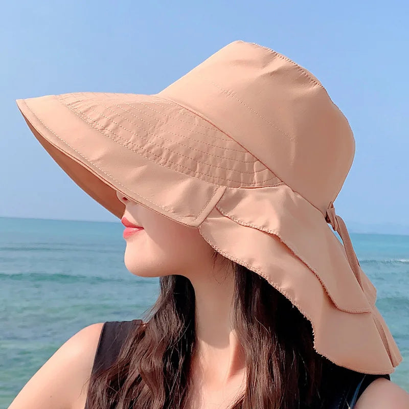 Dames zonnehoed Celeste, breed gerand voor UV-bescherming, perfect voor strand of vakantie.