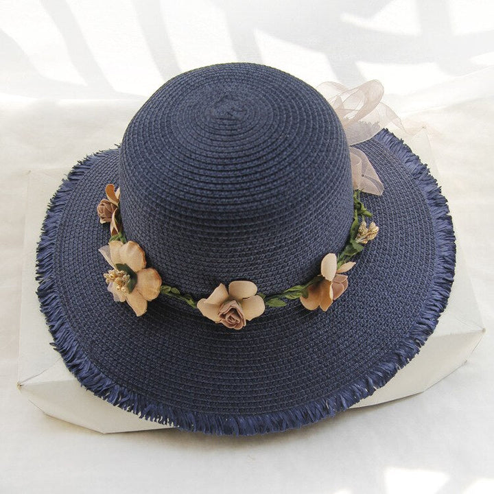 Prachtige dames zomerhoed met elegant bloemenpatroon, een must-have voor elke zonnige dag.