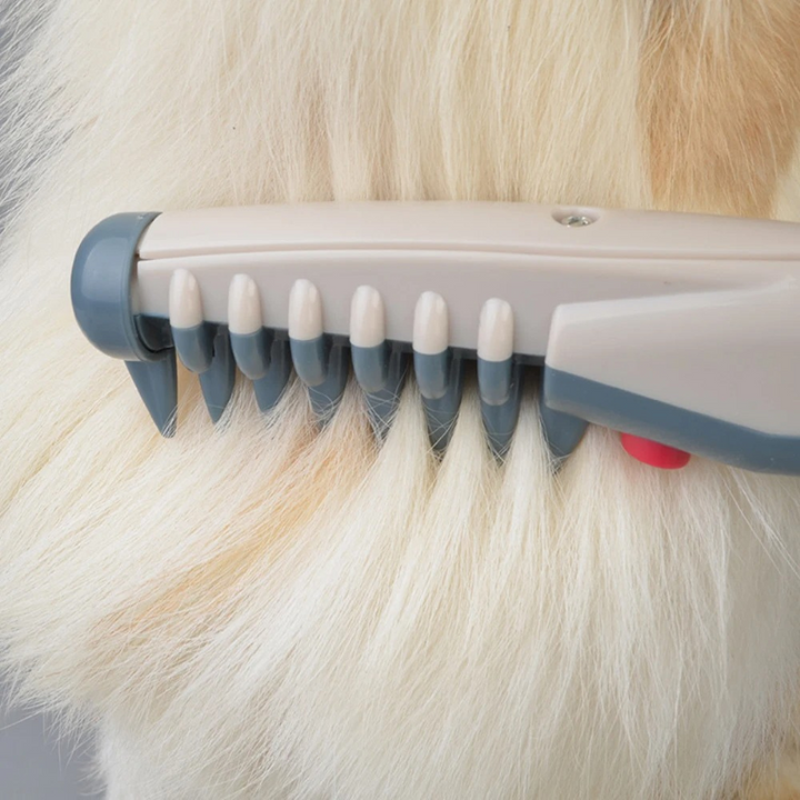 Compacte dierenvacht ontklitter die zacht klitten verwijdert bij zowel katten als honden. Perfect voor dagelijkse verzorging.