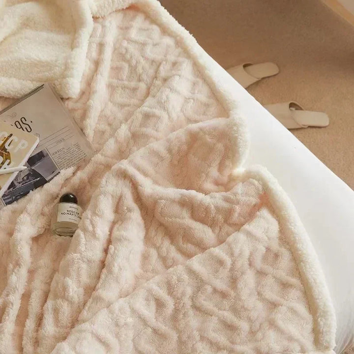 Stijlvolle luxe deken van lamswol en fleece, een warm interieur item voor elk huis.
