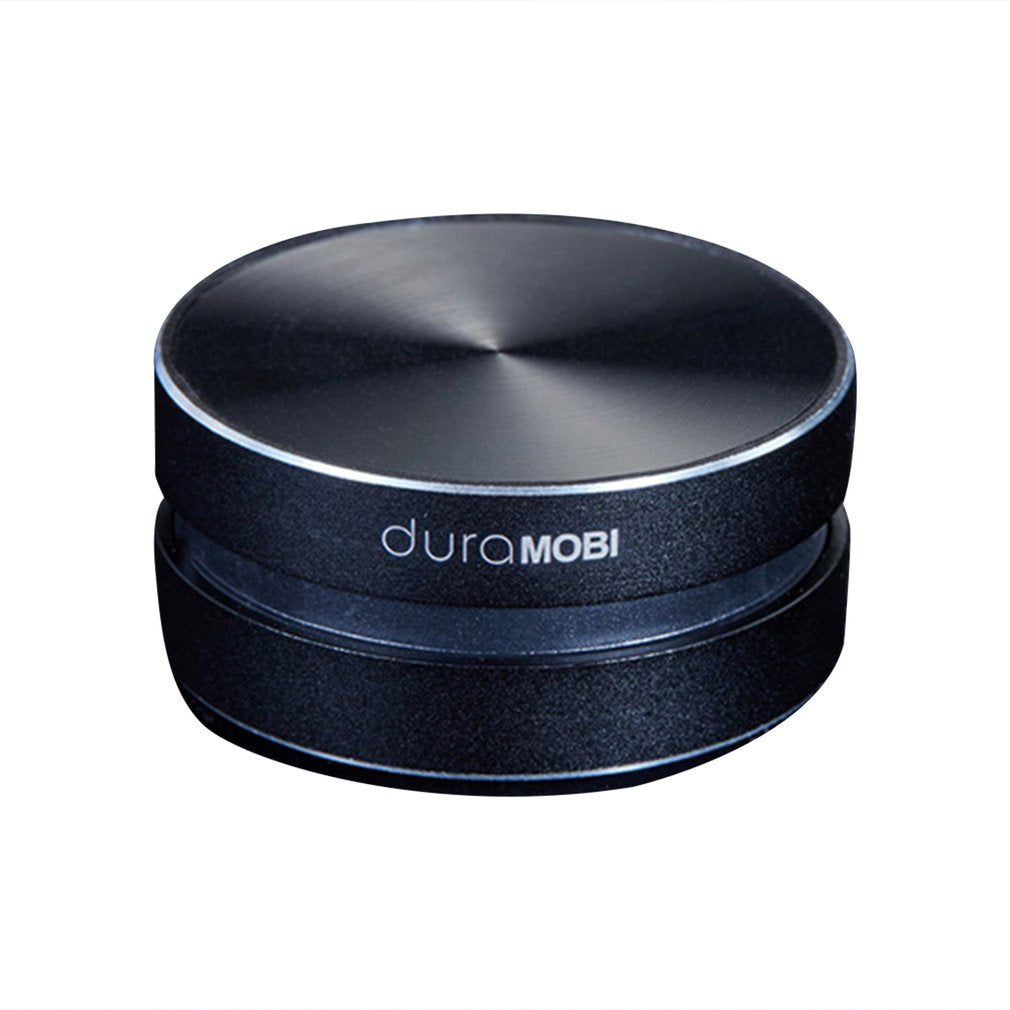 Detailfoto van de innovatieve AnythingSpeaker bluetooth luidspreker, toont compact design en vibratietechnologie.