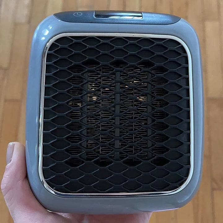 Compacte elektrische verwarming voor een behaaglijke sfeer; ideaal voor kleine ruimtes, veilig in gebruik.