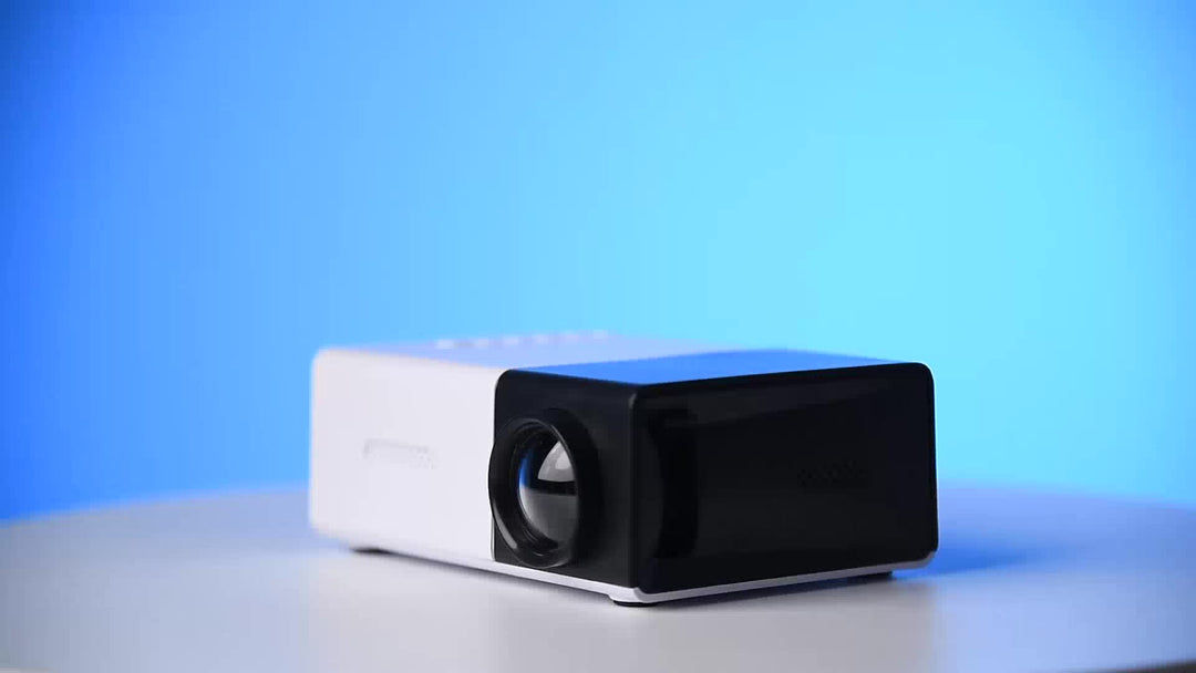 Draagbare mini LED projector met ingebouwde speakers voor films thuis of onderweg.
