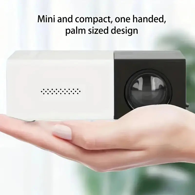 Compacte thuisbioscoop LED projector met speakers, ideaal voor filmavonden en gamen.