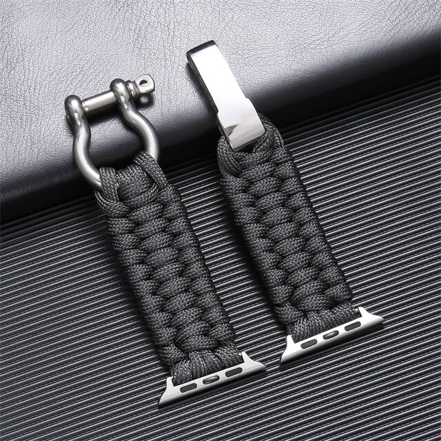 "Duurzaam nylon Okimo bandje voor Apple Watch met robuust paracord design en zware roestvrijstalen sluiting."