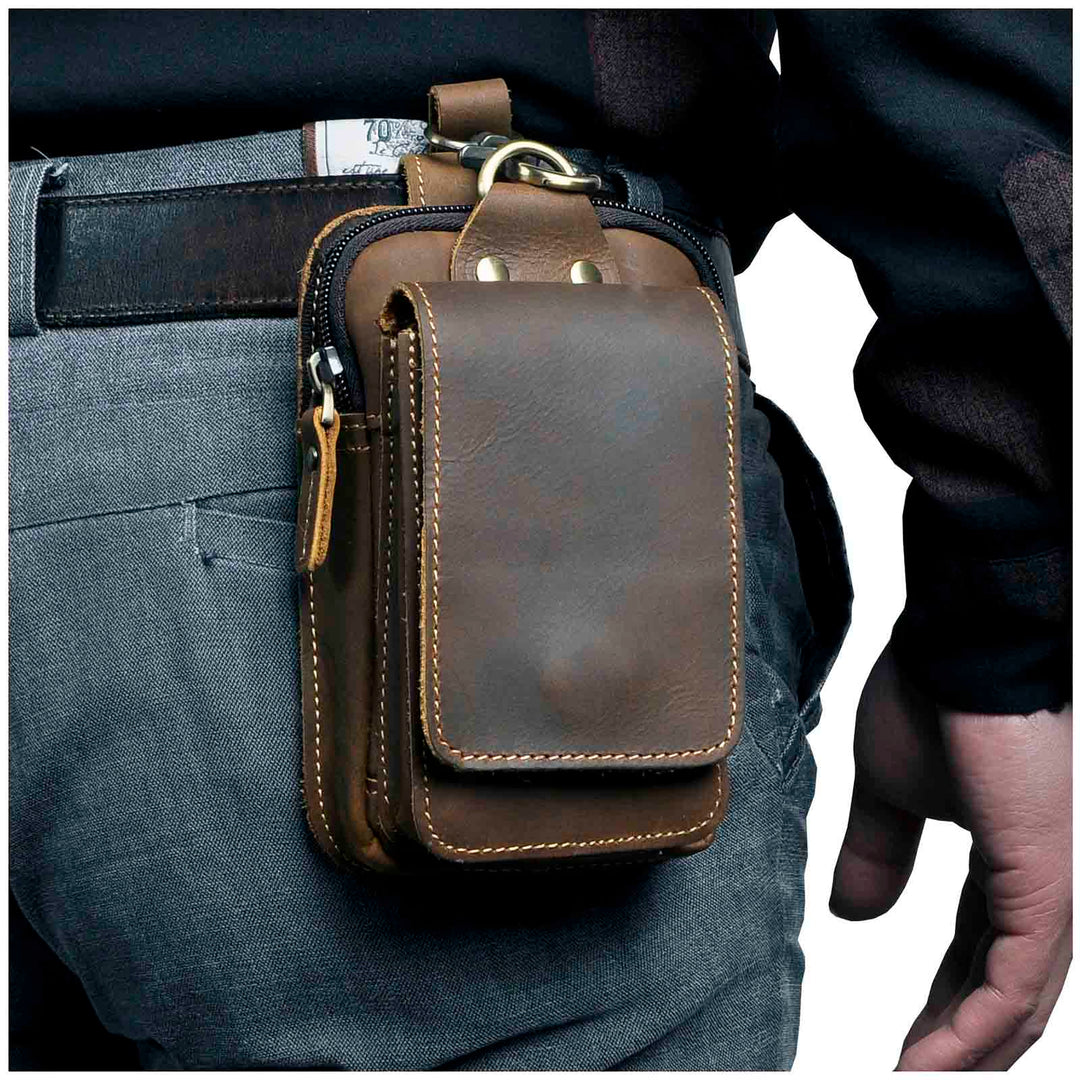 Echt leren heren heuptas, ideaal voor reizen, praktisch telefoontasje. Duurzaam accessoire.
