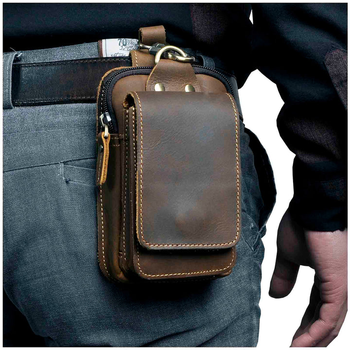 Echt leren heren heuptas, ideaal voor reizen, praktisch telefoontasje. Duurzaam accessoire.