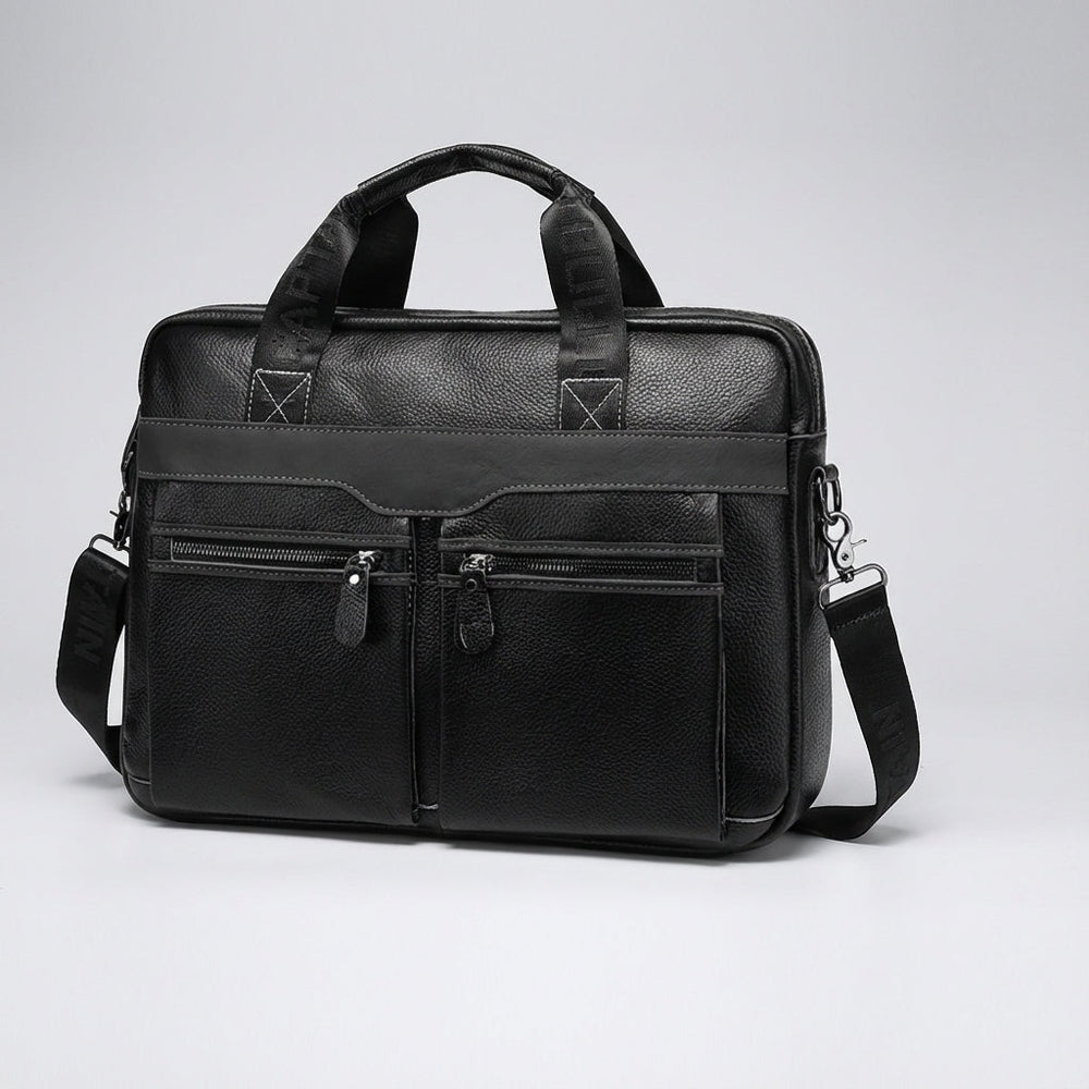 Open UrbanSling laptoptas van echt leer met georganiseerde vakken; ideale aktetas voor accessoires.