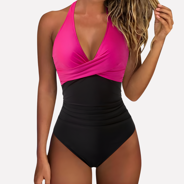 Geplooid damesbadpak met ondersteunend design, perfecte zwemkleding voor wateractiviteiten.