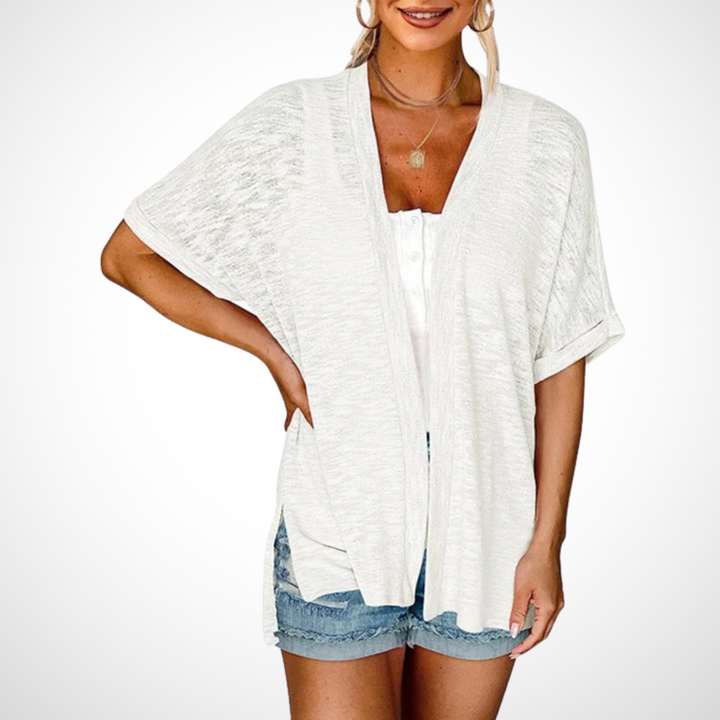 Veelzijdig lichtgewicht cardigan met korte mouwen, ideaal voor casual of elegante laagjes.