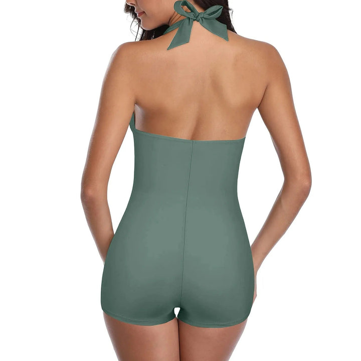 Modern dames badpak met open rug en ingebouwde vormgevende cups, comfortabel voor de nieuwe collectie zwemkleding.