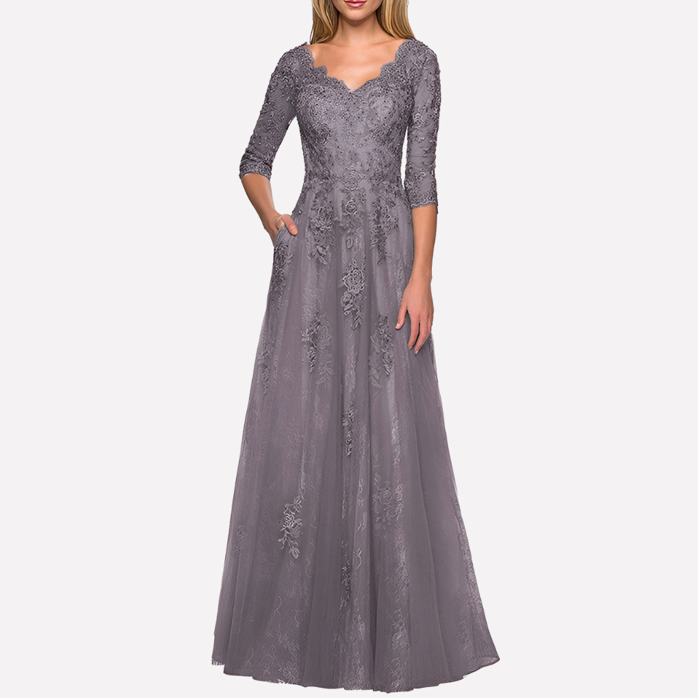 Elegante A-lijn damesjurk met klassieke ronde hals en 3/4 mouw, perfect voor feesten en formele gelegenheden.