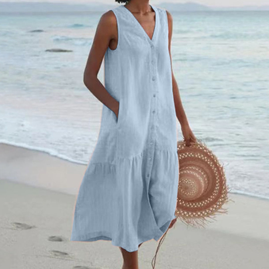 Elegante A-lijn midi-jurk voor dames met decoratieve knoopjes, perfect voor zomerse dagen.